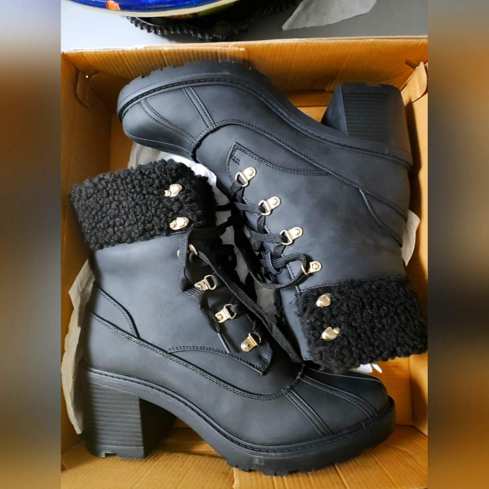 Brand new Black Caviar size 6 boots